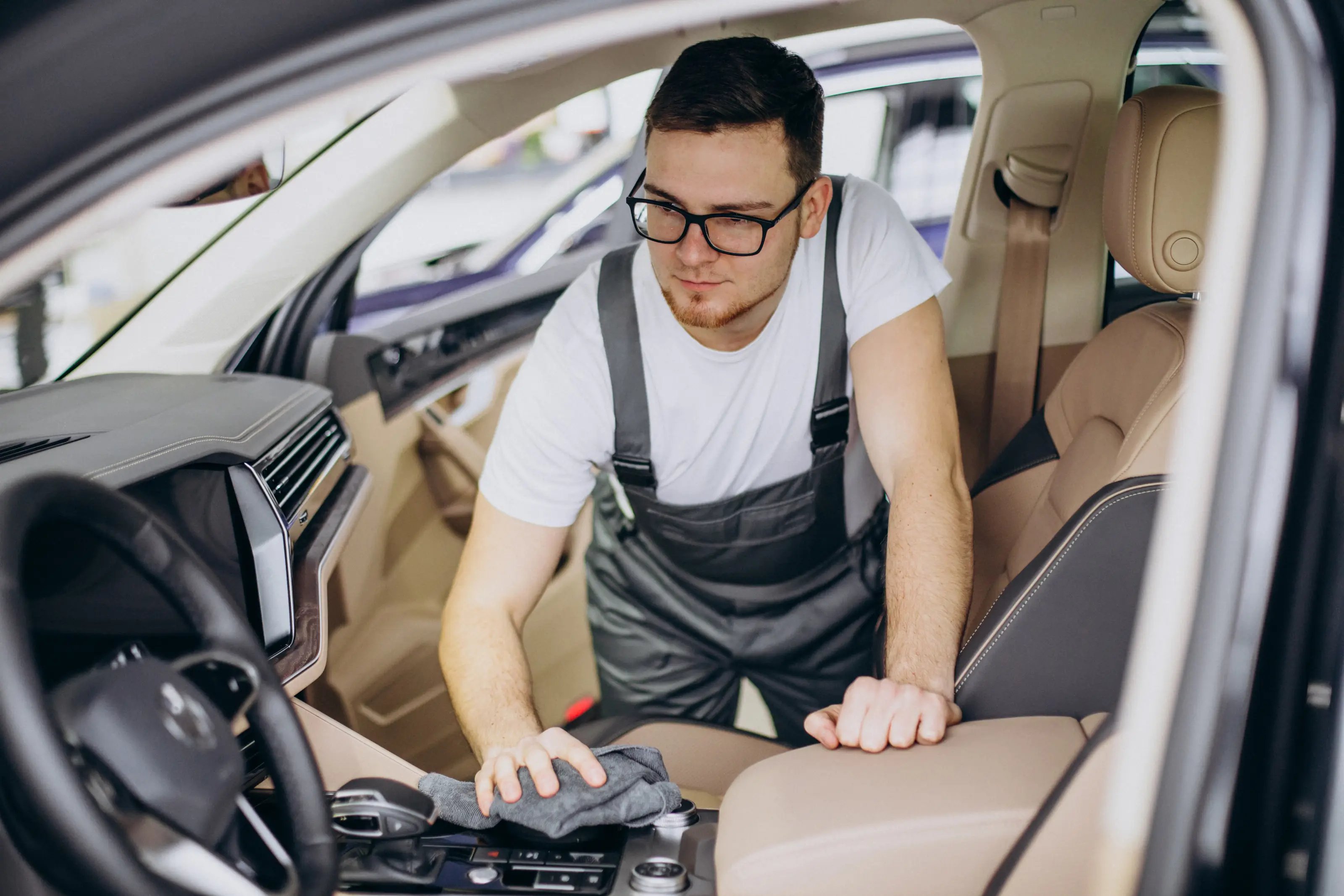 Professional car body polish and wax service being performed to protect paint during monsoon season — Carmaa Car Care